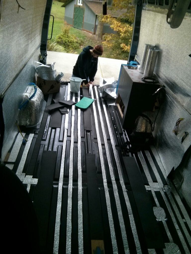 Painted floor with foam strips in gaps between ridges