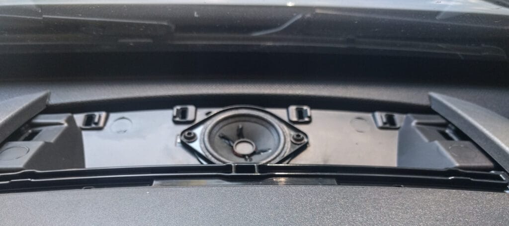 Here's the speaker - two T25 screws hold it in place.