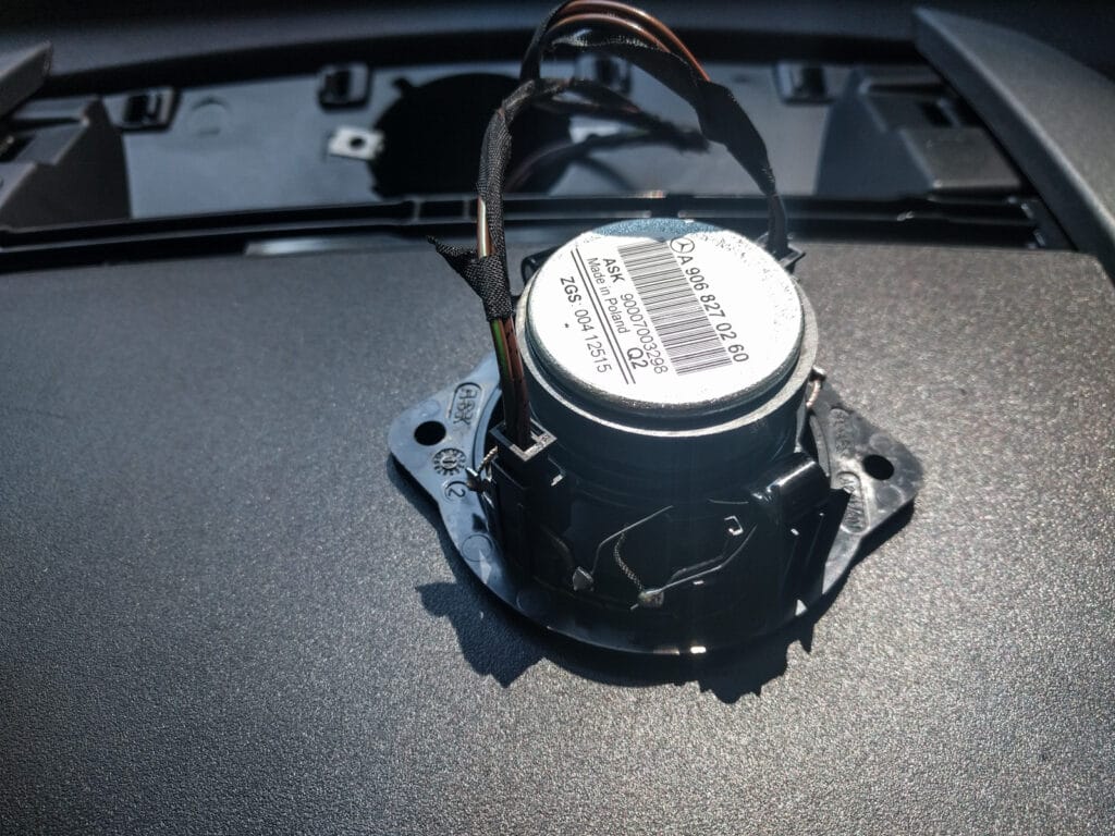 Once the screws are undone, just pull it out. Then you can unhook the two connectors. These might be useful later if you need to hook up a subwoofer.