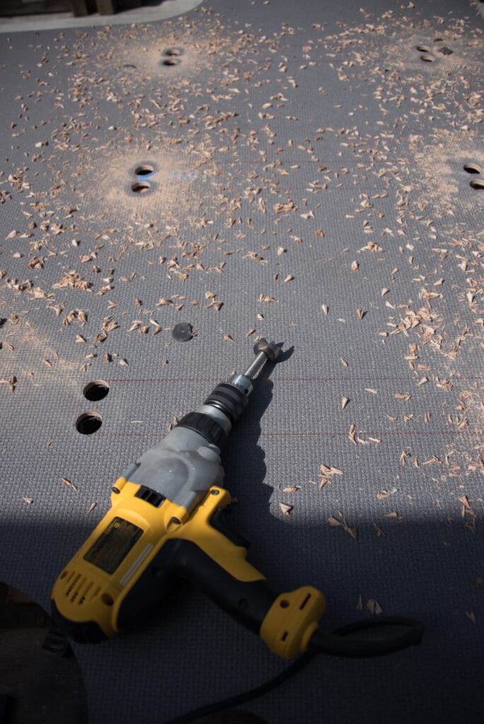 Holes drilled in each corner of the cut-out to give it rounded edges