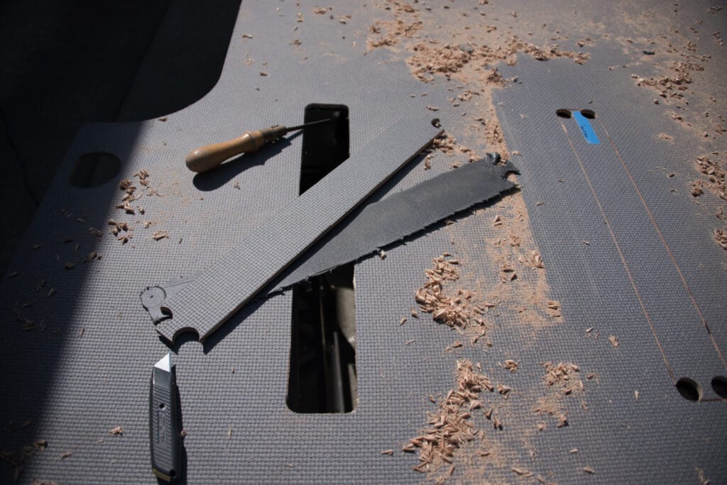 Holes successfully cut for the three seat floor brackets