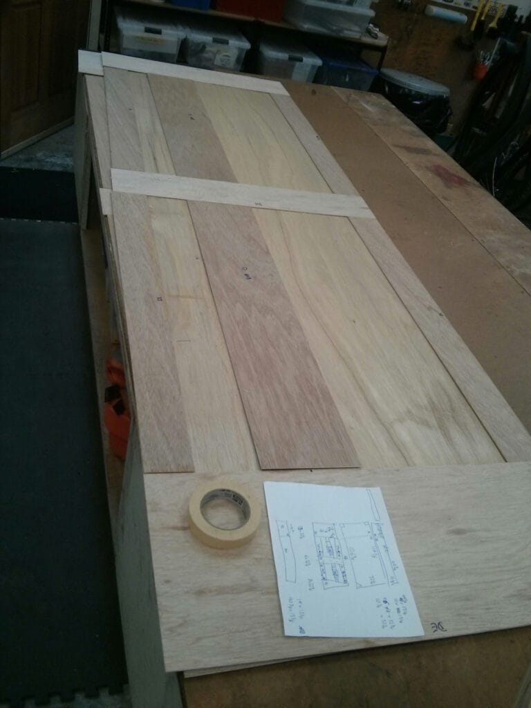 The plywood wall panels are 1/8" doubled up with staggered seams to make a 1/4" thick panel.