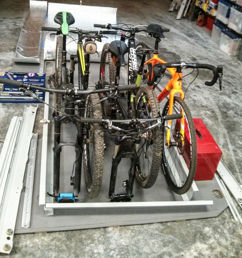 Test-fitting bikes into the slide-out tray we'll use in the van