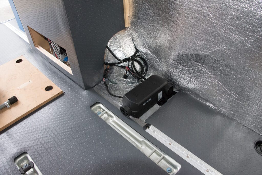 Airtronic heater installed in front of driver side rear wheel
