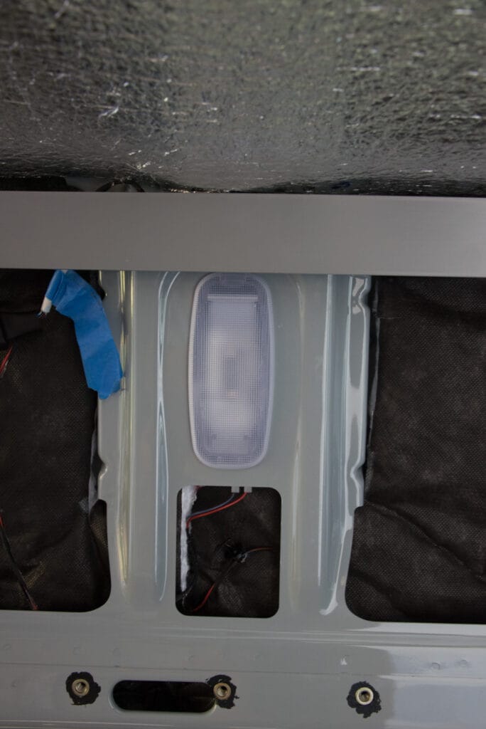 It fits! A courtesy light in the side wall holes