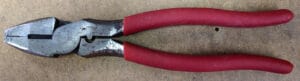 Linesman's pliers with crimper