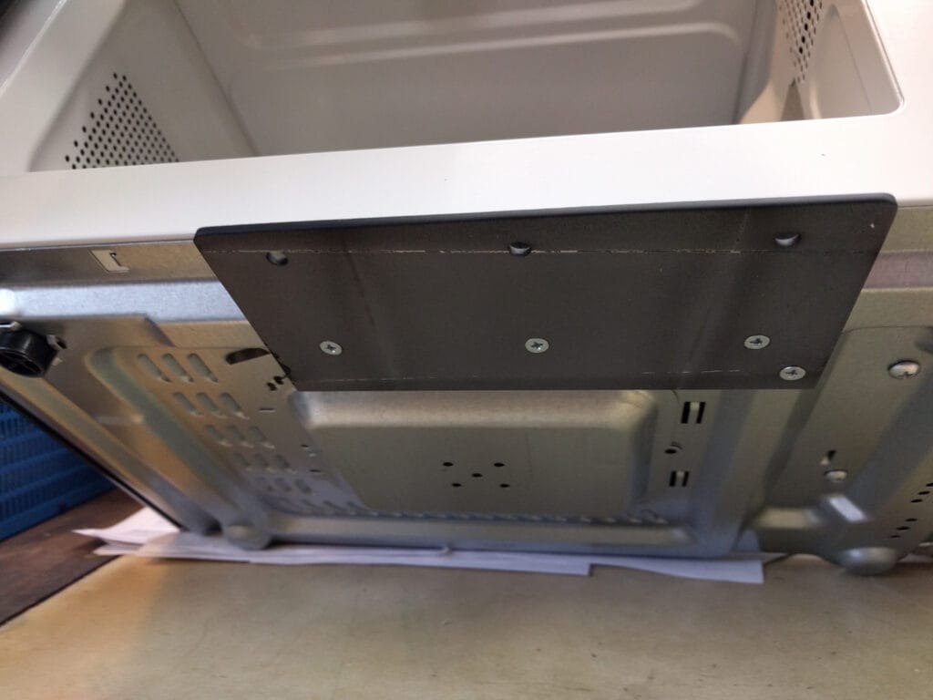 How the microwave attachment plate is attached