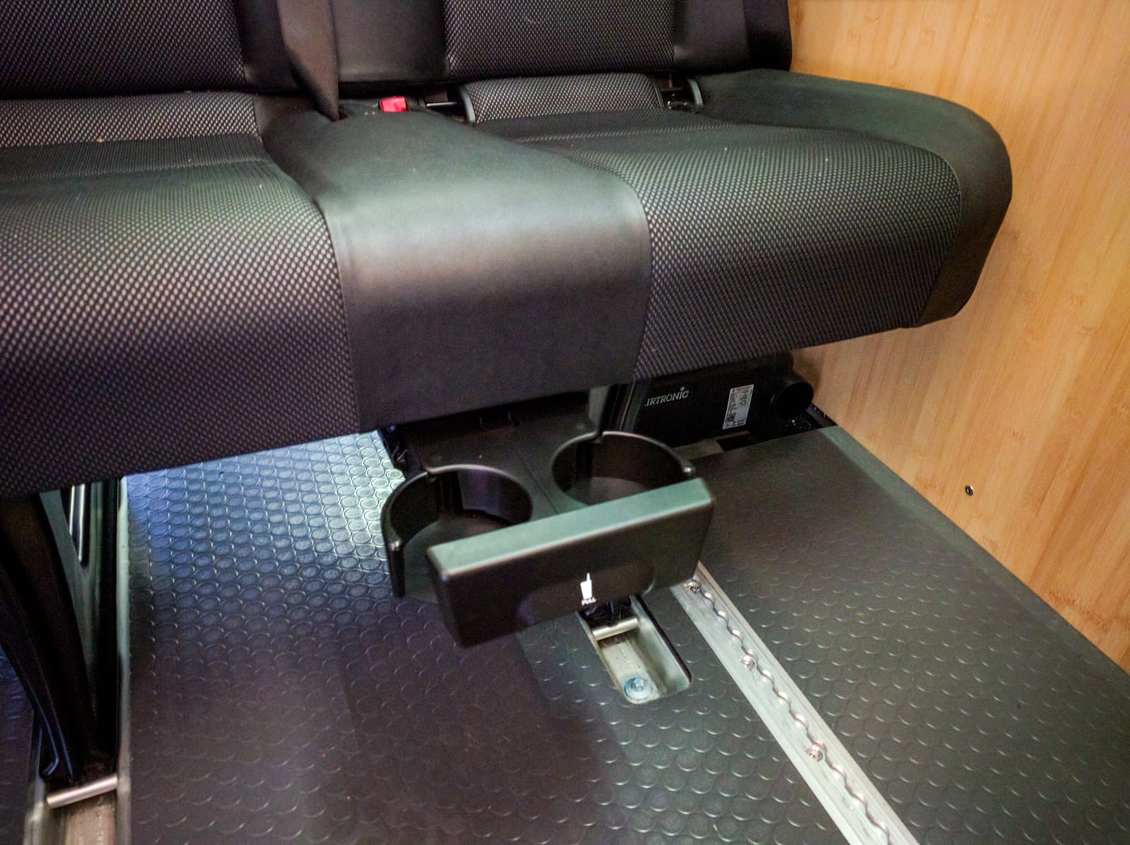 Cupholder under the passenger bench seat