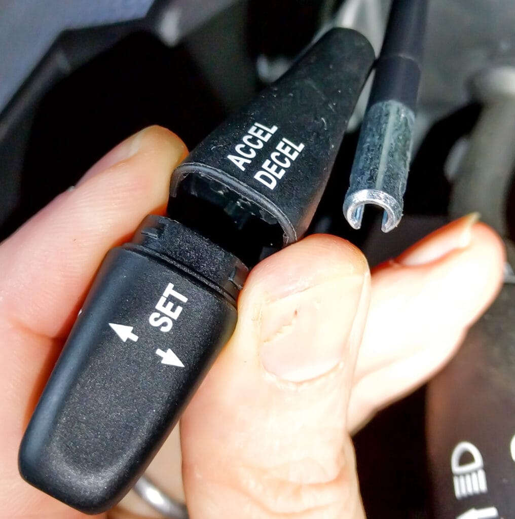 The plastic end comes off in two pieces