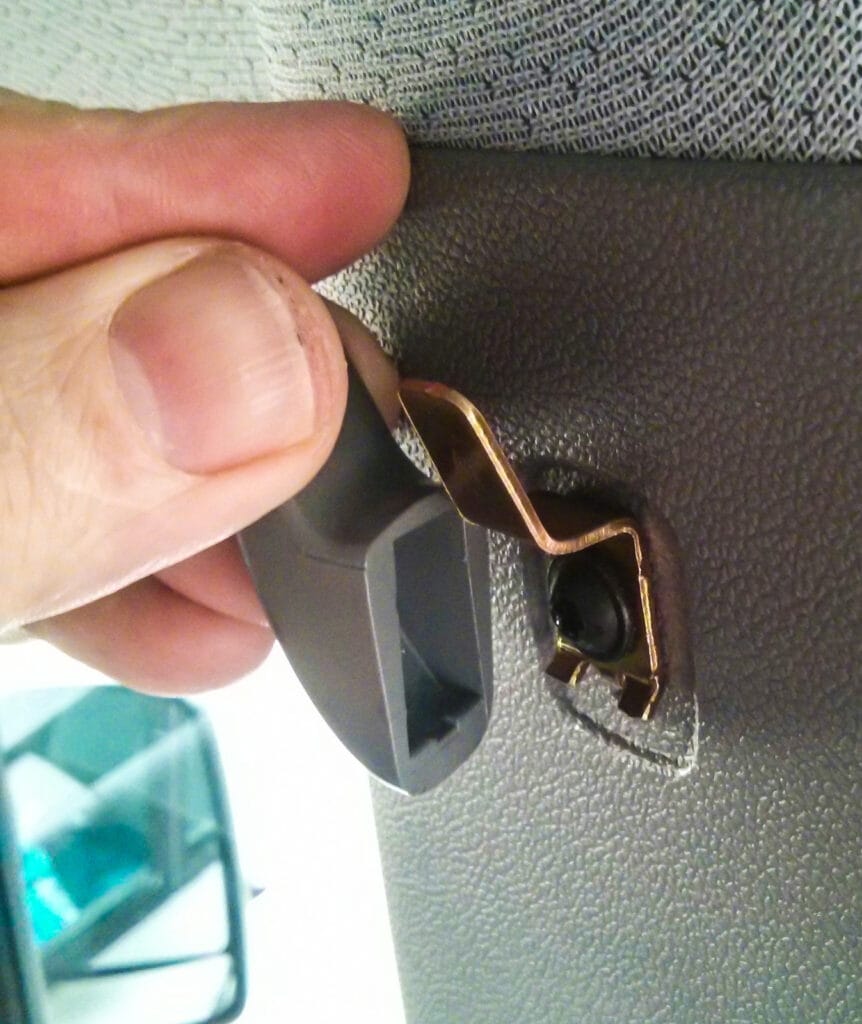 Removing plastic cover from B pillar - coat hook