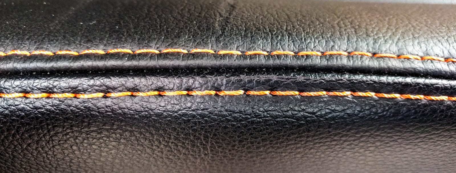 Suspension seat stitching