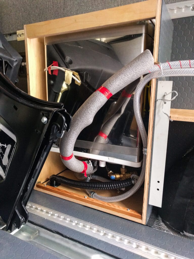 Hot water heater in place - it's a tight fit!