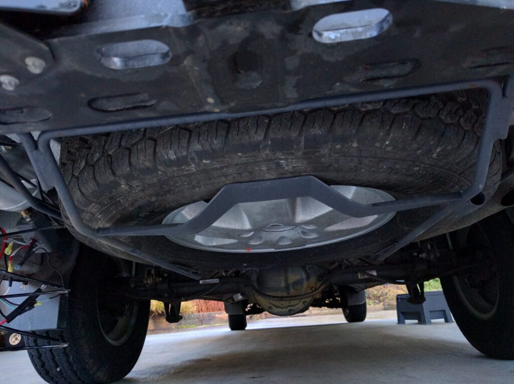Spare tire mounted under Sprinter van