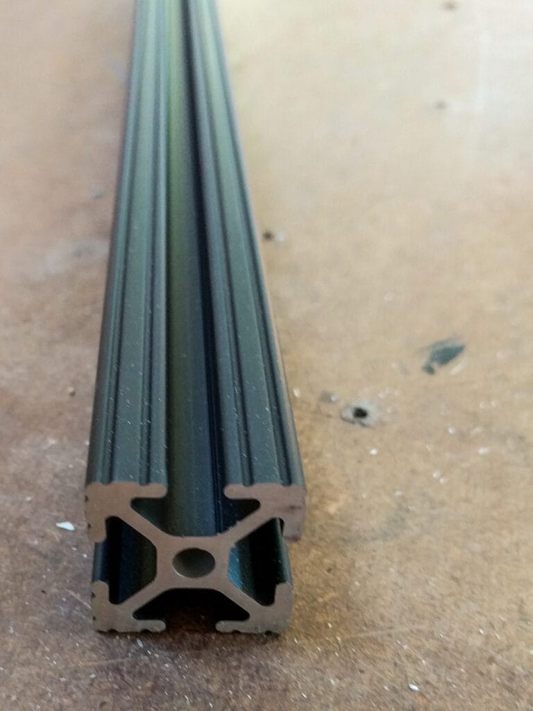 Black anodized 1" 80/20 aluminum t-slot bar