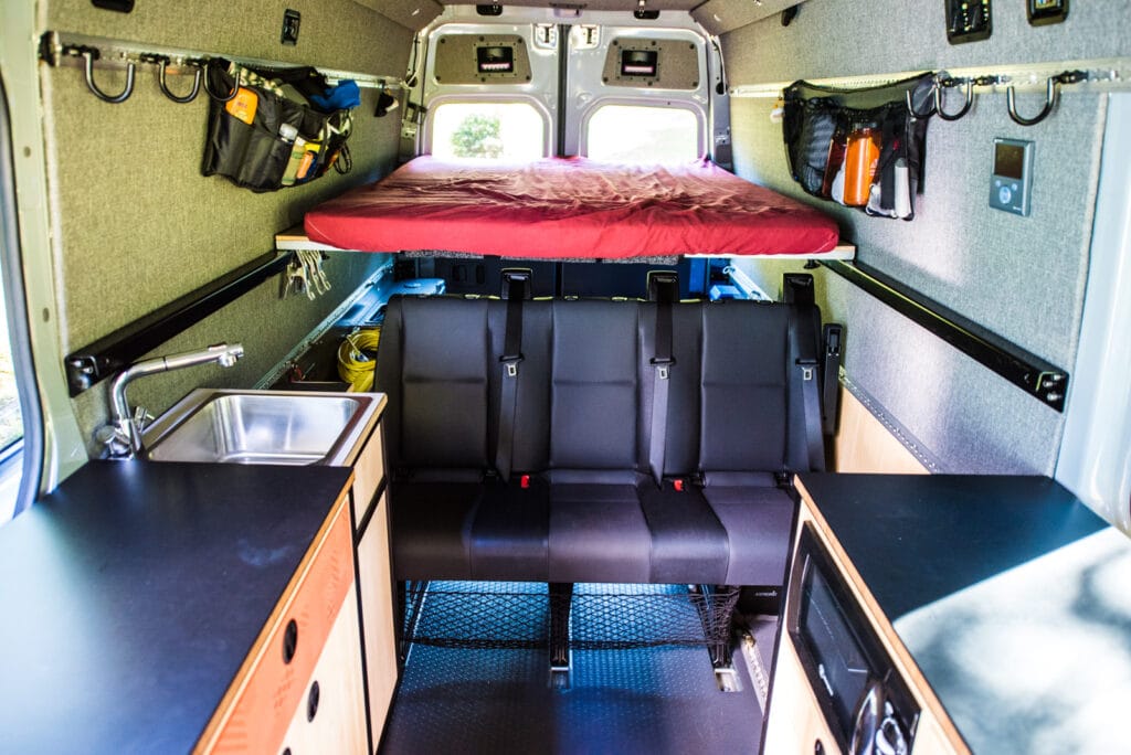 Removable bed platform over rear storage area