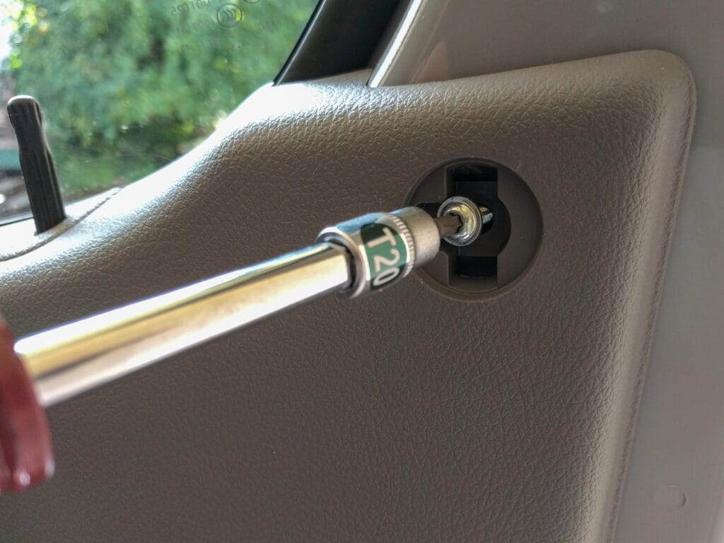 Door panel removal - top screws
