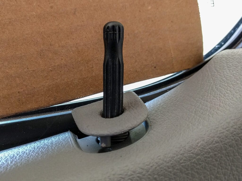 Door panel removal - pop the lock surround out