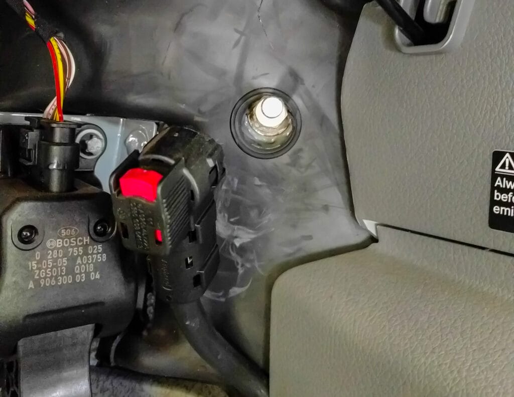 You'll be unplugging the window motor controls and cutting the speaker cables. Be safe rather than sorry - unclip the main power supply next to the accelerator pedal.