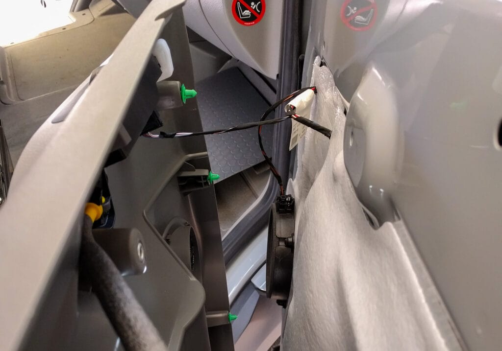 Door panel removal - use the trim tools to free each of the green clips around the edge of the panel
