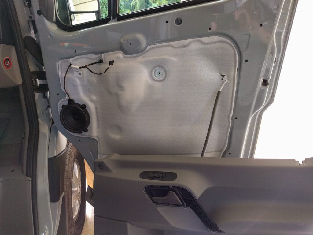 Door panel removal - at some point, it's easier to just pull the panel away rather than using the trim tool. The bottom of the panel hooks in to the metal, so lift, don't pull at the bottom