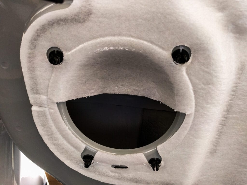 The speaker hole has the white material moulded in to it (to stop water hitting the speaker?) - you may have to remove this if your speakers are deeper than the stock ones.