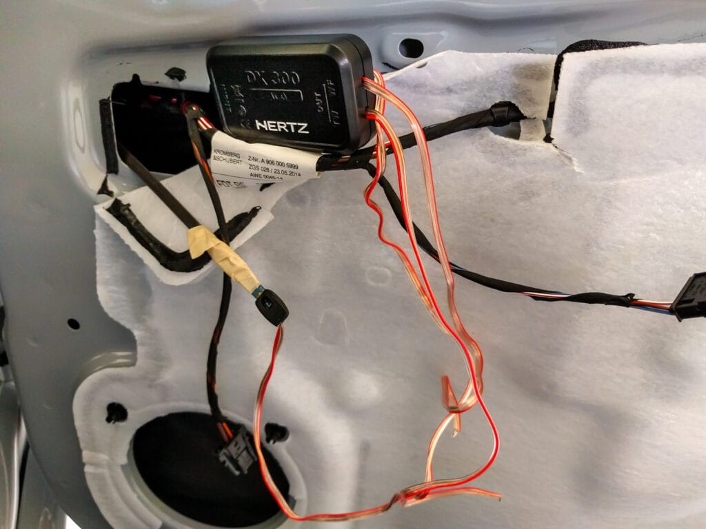 Place the crossover in the door space, then pull the tweeter wire through the wire channel to the dash using a wire fish