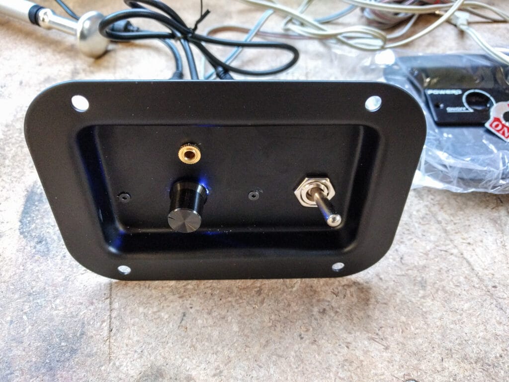 The front of the plate with the components mounted to it.