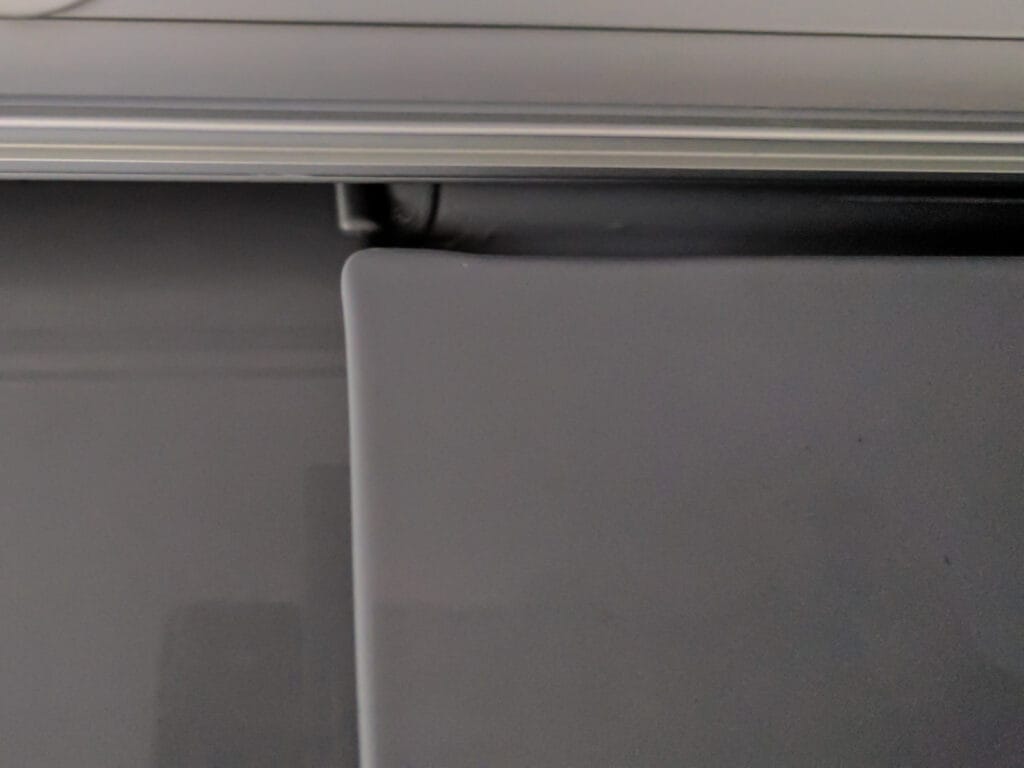 Just under 1/4" clearance. It's close, but it's OK