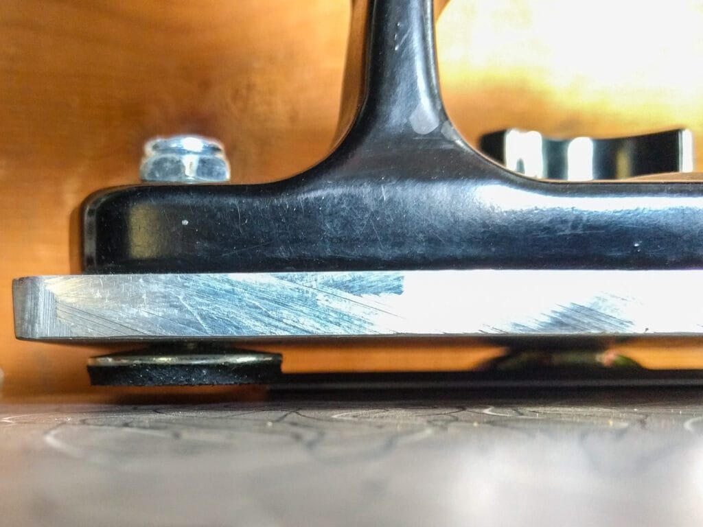 There's space under the aluminum plate. Use rubber or plastic to shim to the correct height