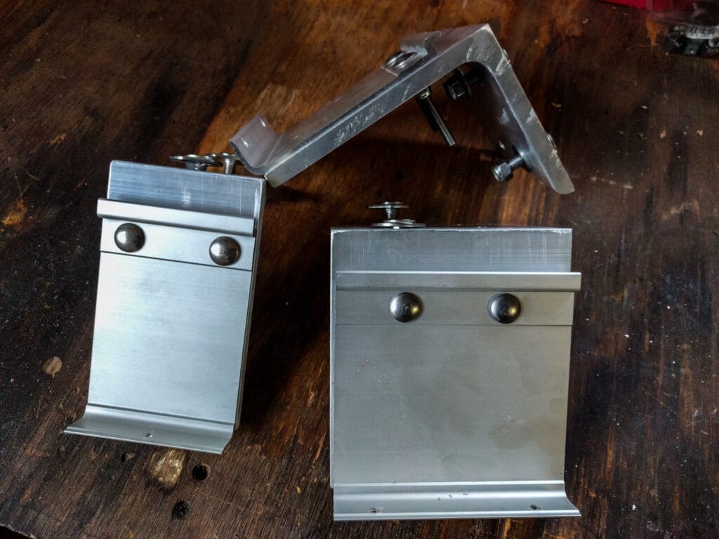 Awning brackets for Fiamma F45 on underside of roof rack
