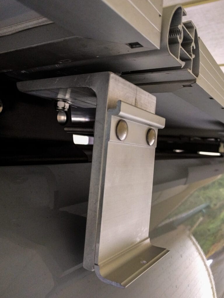 How the brackets attach to the VanTech roof rack t-slots