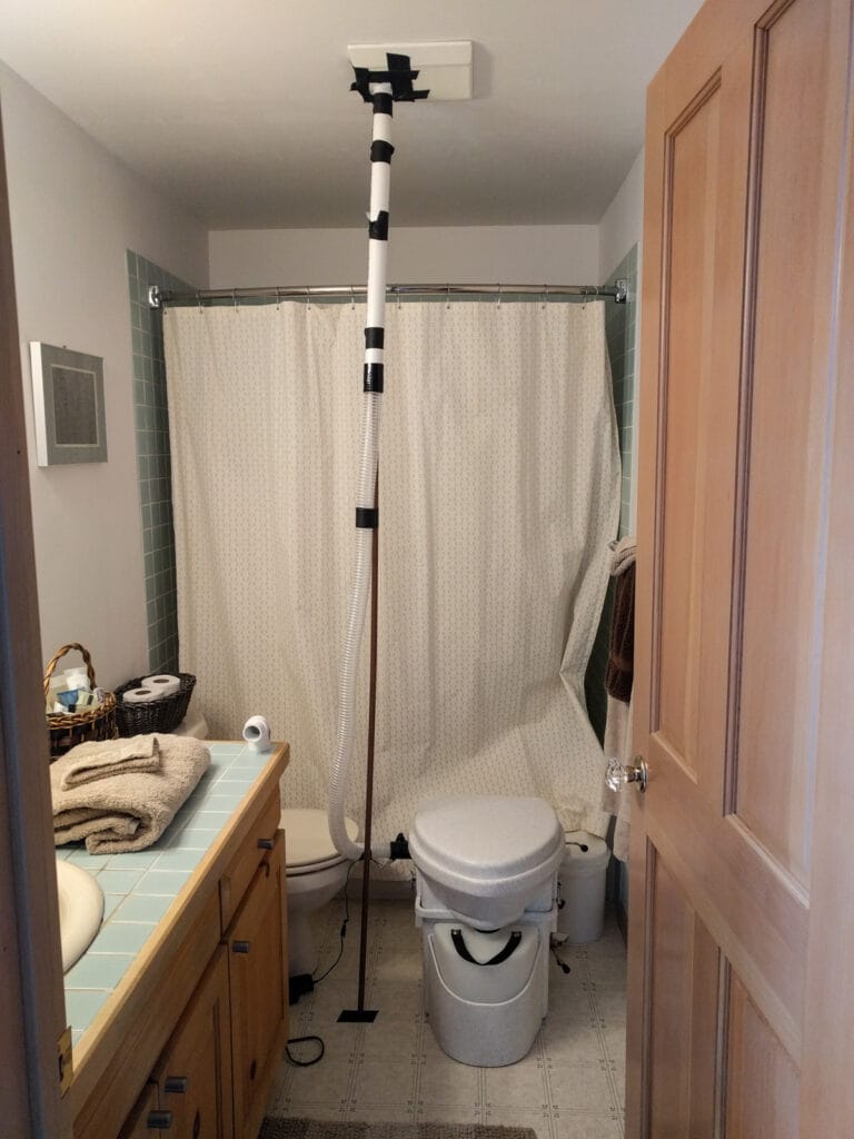 Nature's Head toilet set up in our guest bathroom