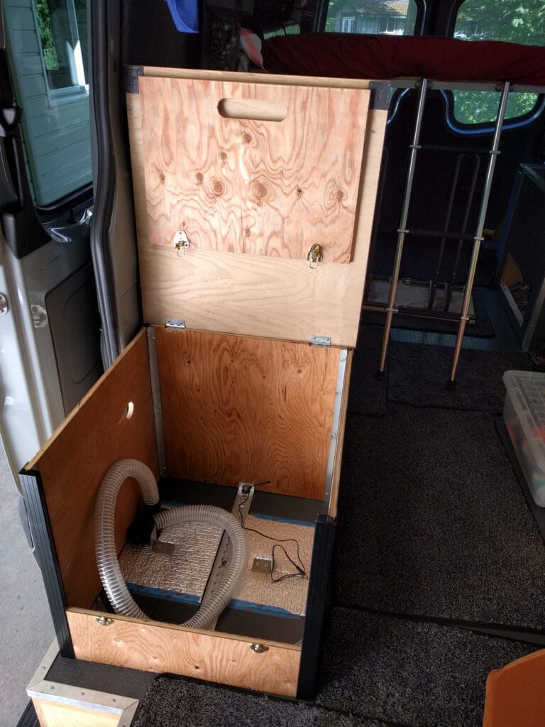 The empty toilet cabinet
