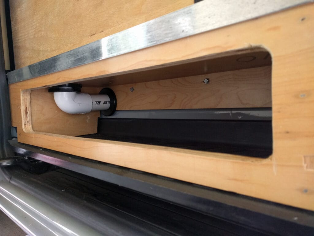 Vent goes through our sliding door step box and then out through the wall of the step area