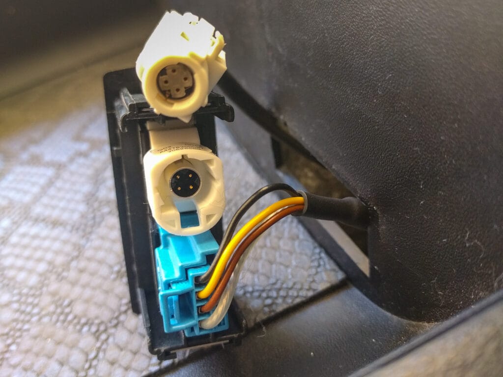 Here's what the USB connector looks like on the back side of the socket in the dash. You can buy an adapter that will turn this into a regular USB plug for your aftermarket stereo.