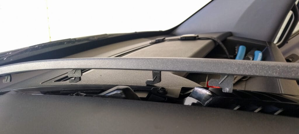 The vent cover panels are held on by one screw at the front of the console, then you just have to pull the whole piece towards you to unclip it.