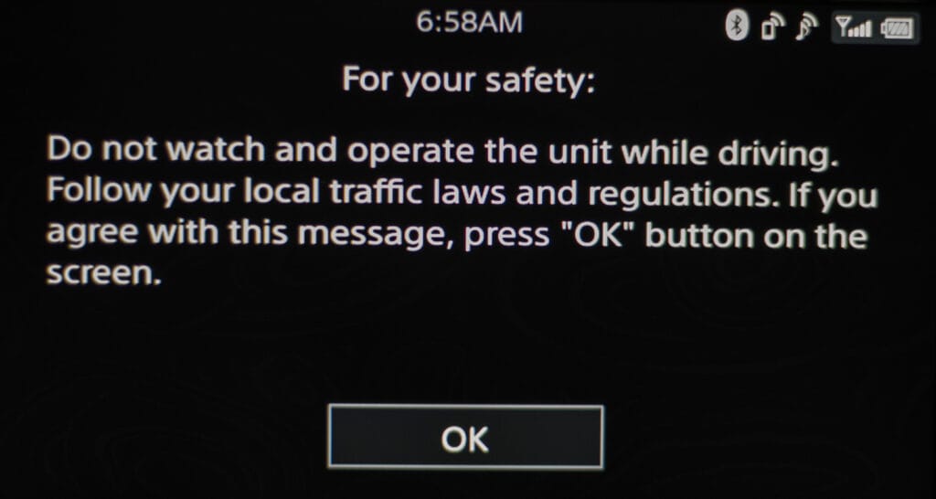 You have to dismiss this warning every time you want to use the XAV-AX100