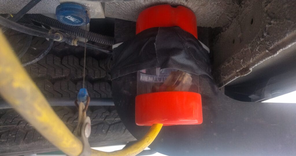 ViewTainer used to hold 15A plug and keep it clean and dry.