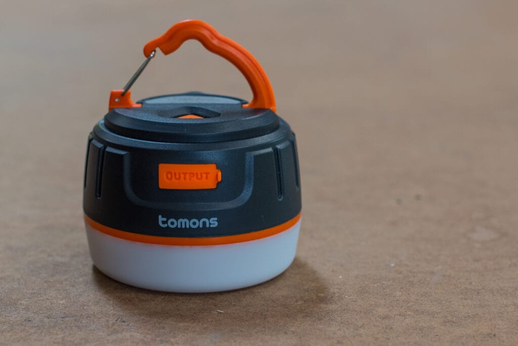 The Tomons Power Pack and Lantern can charge your phone and light your way.