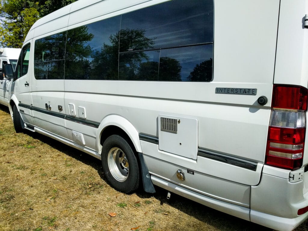 A typical "professional" conversion. Nine separate flaps and hatches on this side of the van. Several more on the other side.