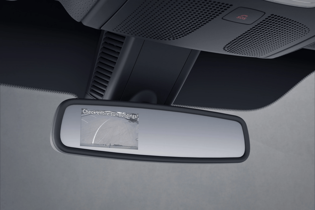 There's an option that places the backup camera display in the rear view mirror